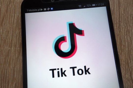 KONSKIE, POLAND - SEPTEMBER 07, 2018: Tik Tok logo displayed on a modern smartphone