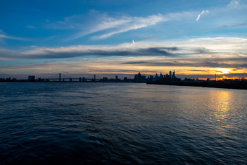 A View of the Philadelphia Skyline and Deleware River at Sunset From Grafitti Pier