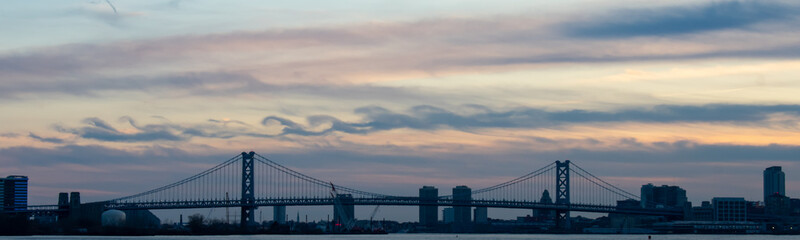 A View of the Benb Franklin Bridge at Sunset From Grafitti Pier