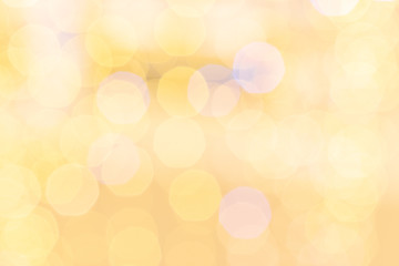 Obraz premium Gold bokeh lights. Abstract glitter festive blur background. Christmas and New Year holidays backdrop