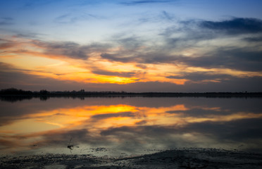 evening landscape with sunset on lake