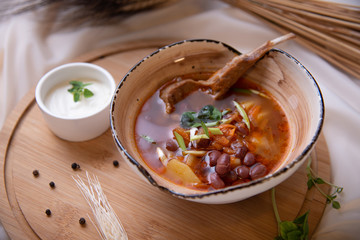 Dishes, food prepared for shooting and shot professionally. with good light. soups and porridges, delicious meat