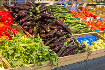 Vegetables on display at the supermarket counter