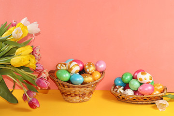 Fototapeta na wymiar Decorated golden easter eggs on trendy pink background. Minimal holiday concept. Happy Easter background, place for text, postcard, banner for the screen.