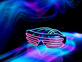 neon glasses are on a colored background