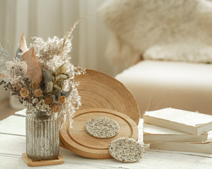 Decorative items in the interior with dried flowers.