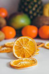 Dried homemade healthy fresh dehydrated slices of fruits. Fruit chips, natural raw vegan organic snack. Healthy food concept. Orange.