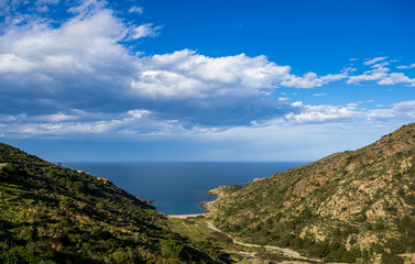 Fototapeta na wymiar Panorama of Rocks on the coast of El Port de la Selva. in a beautiful summer day, Costa Brava, Catalonia, Spain