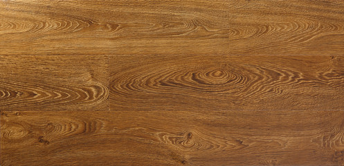 Fototapeta premium Wooden natural texture. New parquet blank. Wooden laminate floor boards background image. Home decor.