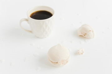 Fototapeta na wymiar cup of coffee with marshmallows.white background.minimalistic style