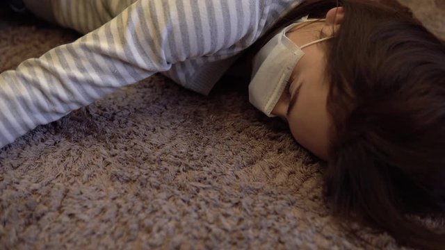 Woman lies on the floor dead on the floor