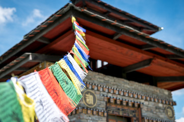 Bhutan Temple in beautiful nature with prayer flags