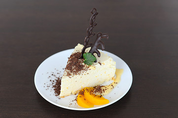 Cream dessert on white plate