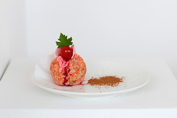 Cream dessert on white plate