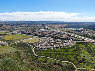 Aerial view of residential subdivision house during sunny day in Torrey Higlands, San Diego, California, USA