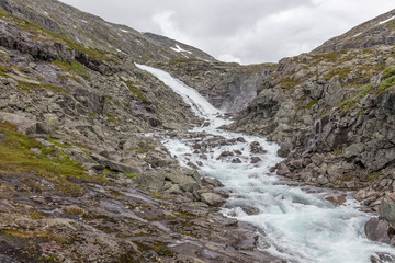 Amazing mountain river in valley in Norway. landscape. Turquoise River. Fast flow mountain River in Norway