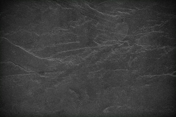 Dark grey black slate background or texture.
