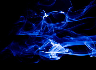 Blue smoke on black background