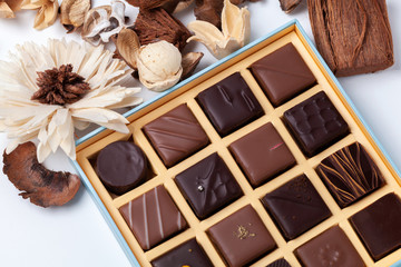 Natural chocolate candies in a beautiful cardboard box.