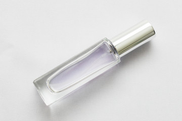 Blank clear perfume bottle on white background