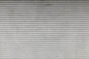 Old, dirty, horizontal texture of street metal shutters.