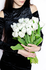 white tulip flowers, bouquet of tulip flowers in den's hands