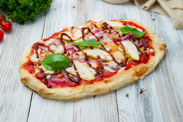 Roman pizza with chicken and bbq sause on Roman dough, pinsa