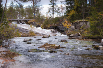 Blurry stream of Forsaleden waterfall in the autumn scenery