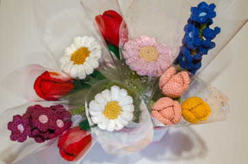  crocheted flowers and toys