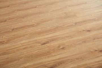 Naklejka premium Wooden natural texture. New parquet blank. Wooden laminate floor boards background image. Home decor.