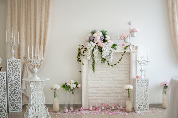 White vintage wall with chandeliers