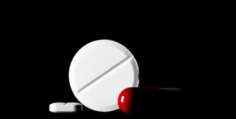 Pills. Medical pills and capsules. Isolated on a black background(alpha channel). A fast-dissolving, effervescent tablet, allergy pill, antibiotics. Virus(Viral) and flu Diseases in Winter.