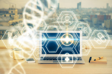 Desktop computer background and DNA drawing. Double exposure. Science concept.