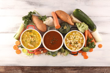 Set of soups from worldwide cuisines, healthy food. Broth with noodles, beef soup and broth with...