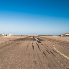 airport runway with traces of braking