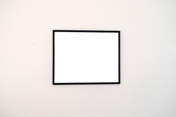 Empty blank picture frame on wall inside building for Advertising media or text