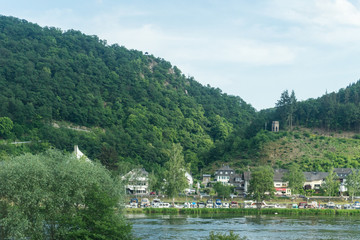Fototapeta premium Germany, Hiking Frankfurt Outskirts, a large body of water with a mountain in the background