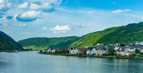 Fototapeta na wymiar Germany, Hiking Frankfurt Outskirts, a large body of water with a mountain in the background