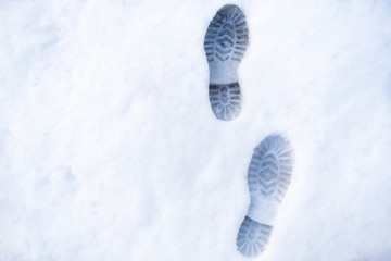 trail of shoes in the snow, tread in the snow