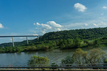 Fototapeta premium Germany, Hiking Frankfurt Outskirts, a bridge over a body of water