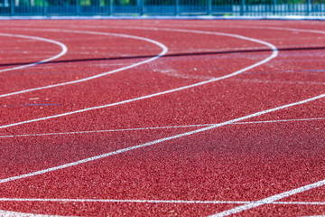 Red running sport track background and texture. Sport running track concept.