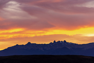 Fototapeta na wymiar Stunning colorful sunset against Andes mountains range in Esquel Patagonia, Argentina