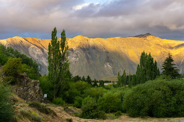 Fototapeta na wymiar Alpenglow over the mountain top during sunset in Esquel, Patagonia, Argentina