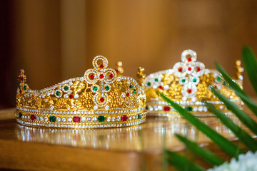 Pair of traditional orthodox christian crowns for marriage ceremony