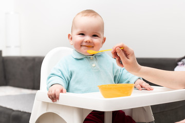 Baby Child Eating In Chair