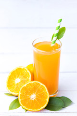 Fresh orange juice with slices fruits, isolated on white background, Selective focus, Copy space.