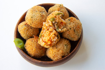 Deep Fried Tomato Sauce Risotto Balls with basil