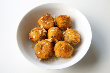 Deep Fried Tomato Sauce Risotto Balls with basil