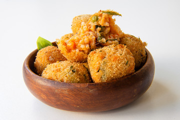Deep Fried Tomato Sauce Risotto Balls with basil