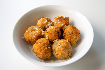 Deep Fried Tomato Sauce Risotto Balls with basil